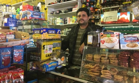 Omar Algahim works at a corner store in San Francisco’s Tenderloin.