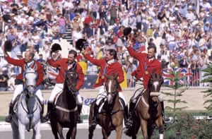Australia’s equestrian eventing team parading around the Sydney International Equestrian Centre on day four of the games.