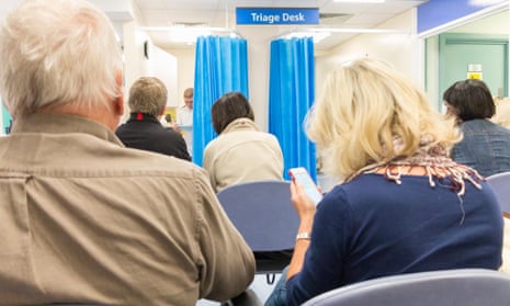 A waiting room at an NHS health centre in London
