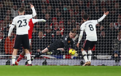 Manchester United's David De Gea saves from Arsenal's Eddie Nketiah.