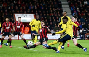 Arsenal’s Bukayo Saka lashes in the opening goal.