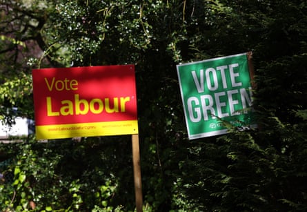 Vote Labour and Vote Green signs