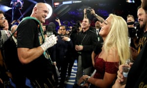 Tyson Fury sings to his wife, Paris, following Saturday night’s victory