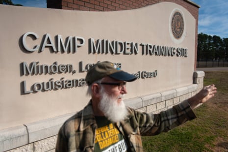 Environmentalist Ron Hagar stands at the entrance of the Camp Minden Training Site in Minden, Louisiana on 7 December.