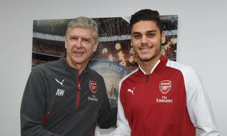 Konstantinos Mavropanos shakes hands with Arsène Wenger after agreeing a transfer to Arsenal.