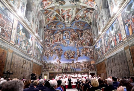 Michelangelo’s frescoes soared over the historic event.