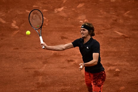 Alexander Zverev plays a forehand return but Ruud holds his serve.