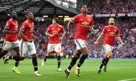 Manchester United v Leicester City - Premier League<br>MANCHESTER, ENGLAND - AUGUST 26: Marcus Rashford of Manchester United celebrates scoring his sides first goal with his Manchester United team mates during the Premier League match between Manchester United and Leicester City at Old Trafford on August 26, 2017 in Manchester, England.  (Photo by Michael Regan/Getty Images)
