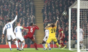 Georginio Wijnaldum hooks the ball into the roof of Genk’s net to give Liverpool the lead.