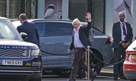 Boris Johnson arrives at Gatwick Airport in London, yesterday 