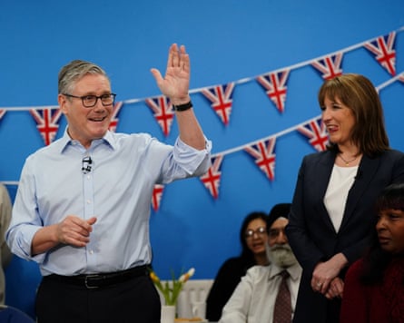 Keir Starmer waves and Rachel Reeves smiles at an event