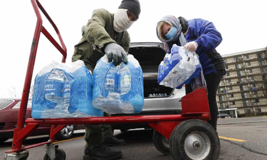 Bottled water at a food pantry in Detroit in March last year. Even before the pandemic, the cost of water and sewage was already a growing problem.