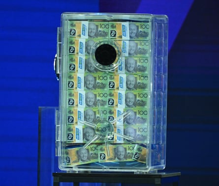 A box of one hundred dollar notes with the face of Tennis Australia’s chief executive, Craig Tiley, printed on them