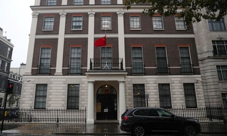 Front view of the building with its Chinese flag