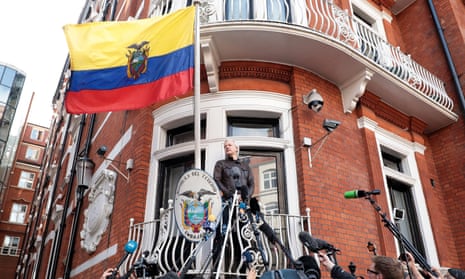 Julian Assange speaks to the media from the balcony of Ecuadorian embassy in London in May 2017.