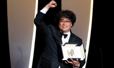 Bong Joon-ho with the Palme d’Or at Cannes, after winning for Parasite.