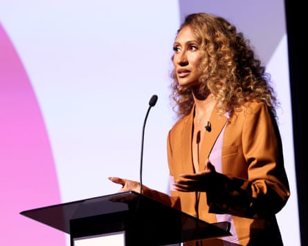 Woman speaking on stage
