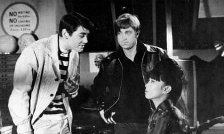 Tony Booth, left, John Forgeham and Yôko Tani in the 1963 film The Partner.
