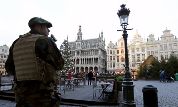 A Belgian soldier patrols on Brussels' Grand Place