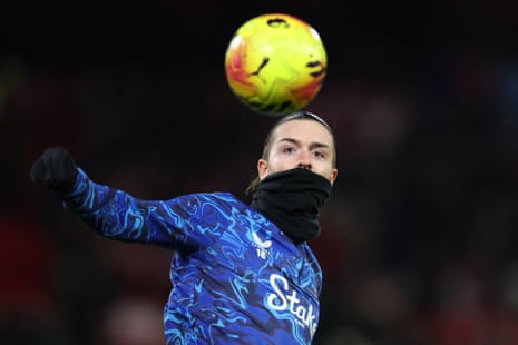 Jack Grealish warms up.