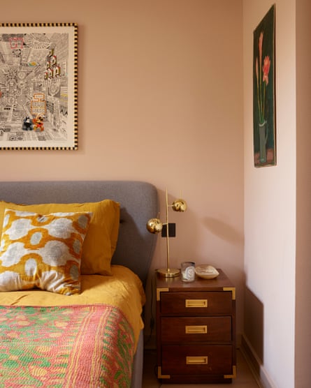 In the main bedroom, an Ercol furniture is reupholstered successful grey wool, and the overgarment colour is Dulux 90YR 59/108. The artwork is by Pedro Friedeberg