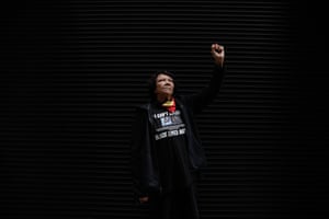 Leetona Dungay with her fist in the air
