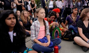 Thunberg listens to speakers during a climate change demonstration at the US supreme court in Washington DC on Wednesday.