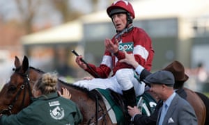Davy Russell hears that he won the race on Tiger Roll in a photo-finish for the 2018 Grand National.