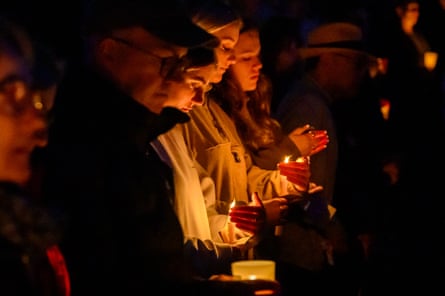 People attend a candlelight vigil for the victims of a stabbing attack at the Bondi Junction Westfield shopping centre in Sydney
