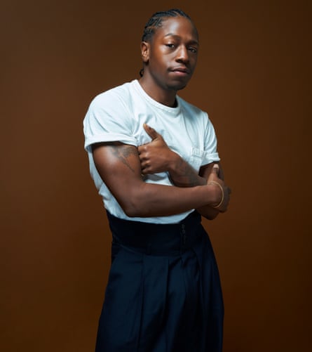 Actor David Jonsson in a white T-shirt and blue trousers