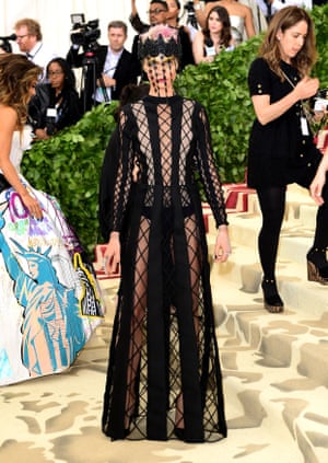 Current British Vogue cover star Cara Delevingne was responsible for one of the most dramatic ensembles of the evening – a caged creation by Christian Dior.