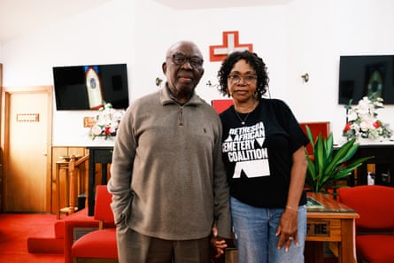 A man and a women standing in a church