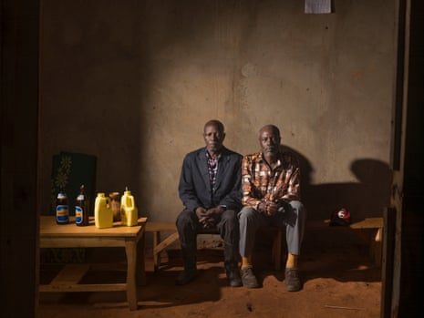 Pascal Mutarambirwa (on right) whose family were killed by a group including Rafael Magesa (on left) during the Rwandan genocide