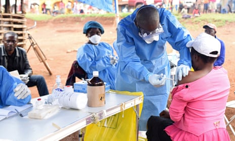 A health worker administers the Ebola vaccine in the village of Mangina in the North Kivu province of the Democratic Republic of the Congo.