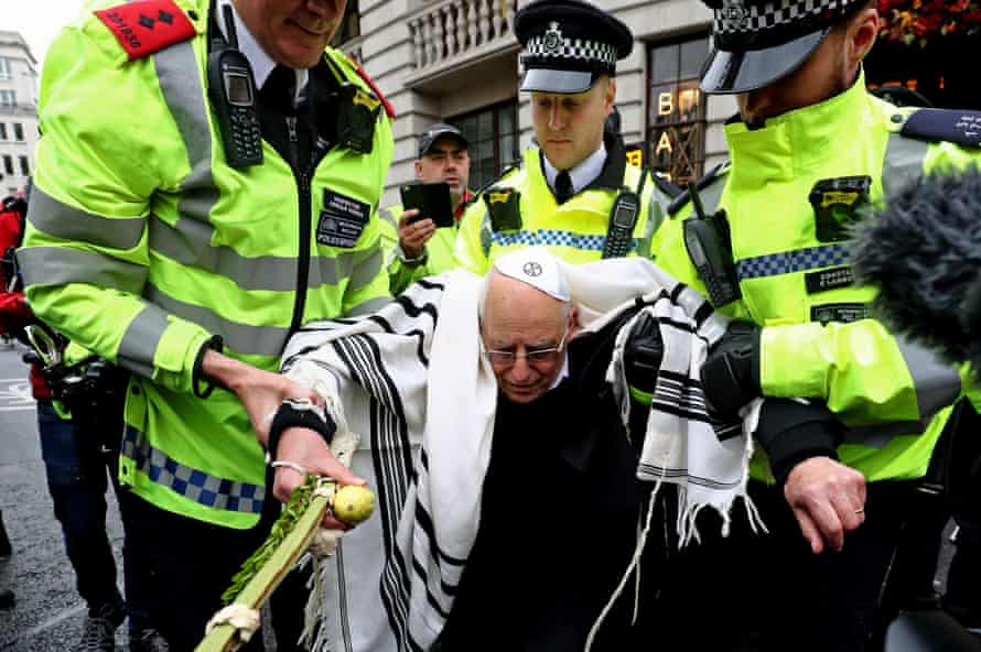 Extinction Rebellion protestsRabbi Jeffrey Newman is arrested as protesters continue to block the road outside Mansion House in the City of London, during an XR climate change protest.Monday October 14, 2019.