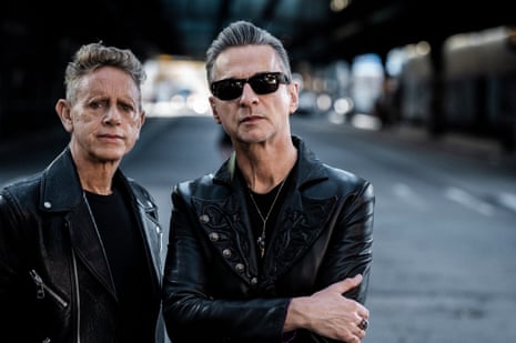 Portrait of Martin Gore (left) and Dave Gahan in black biker jackets.