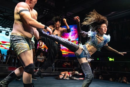 Athletes perform at the 10-year anniversary event for MKW in Beijing on Saturday.