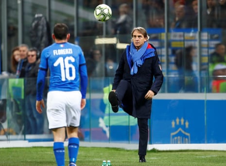 Roberto Mancini shows his players how to master the football.