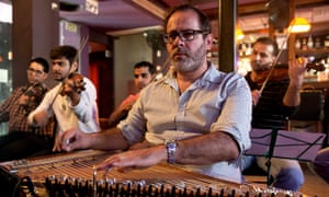 The Firqat Alnoor orchestra rehearses in Tel Aviv. The instrument in the centre of the picture is the kanun, prominent in eastern music either as a solo instrument or part of an ensemble.