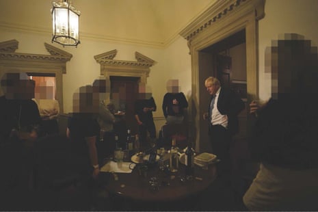 Boris Johnson (right) at a leaving gathering in the vestibule of the press office in Downing Street.