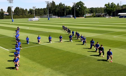The Chelsea squad take the knee during a training session at Cobham earlier this month.
