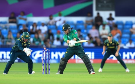 Pakistan's Iram Javed (centre) is bowled out by Australia's Georgia Wareham.