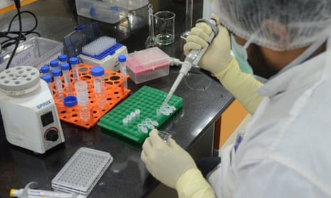 A research scientist works in a laboratory at the Serum Institute of India.