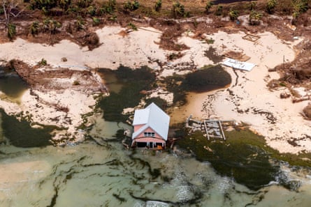 Aerial view of a building amid coastal flooding