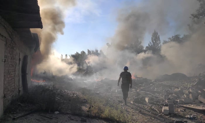 A rescue worker walks among debris at a residential area destroyed by a Russian military strike in the town of Toretsk, Donetsk region, Ukraine on 27 July.