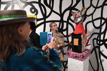 Attendees view an art exhibit during a 2019 edition of the Bombay Beach Biennale.