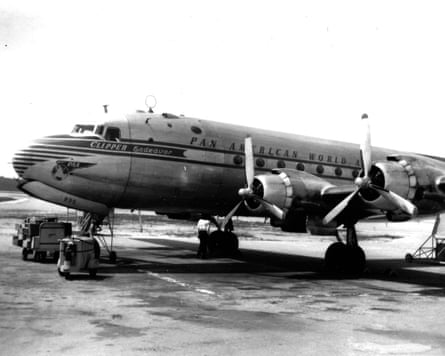 Front section of a four-engined propeller airliner in black and white