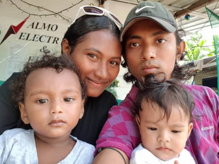 Haroon Rashid with his wife Molly, son Mohammed (left) and daughter Almeera (right) on Manus Island in Papua New Guinea Rashid.