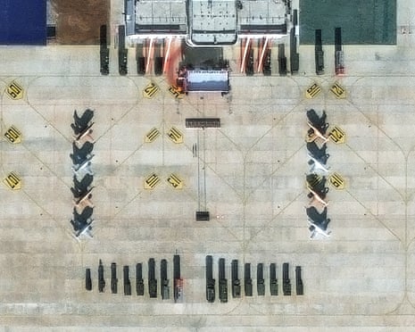 Satellite image shows aircraft and vehicles at a China-Laos joint training facility