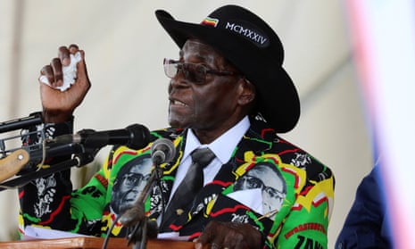 President Robert Mugabe speaks to supporters gathered to celebrate his 93rd birthday near Bulawayo.